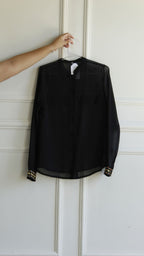 Camisa